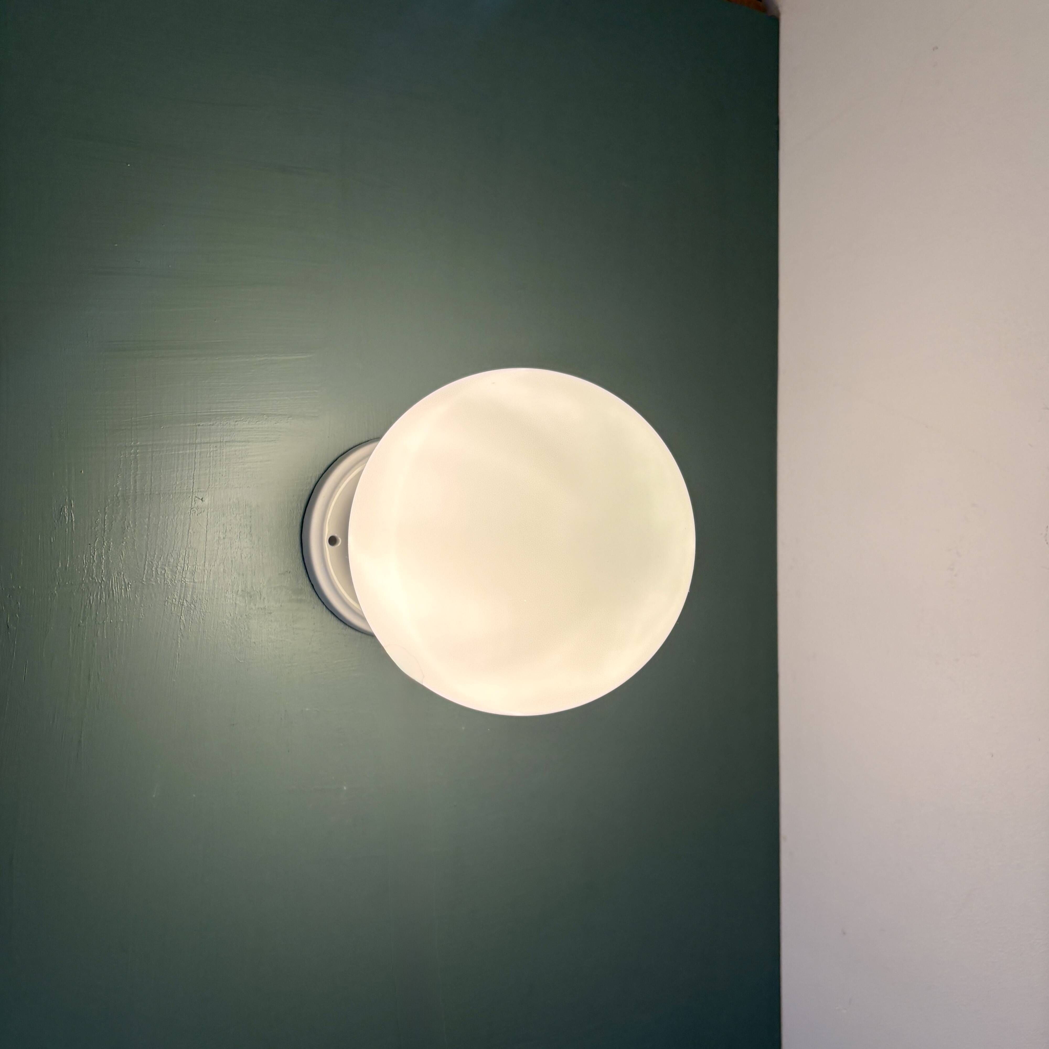 Vintage globe wall or ceiling light in white opaline.