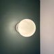 Vintage globe wall or ceiling light in white opaline.