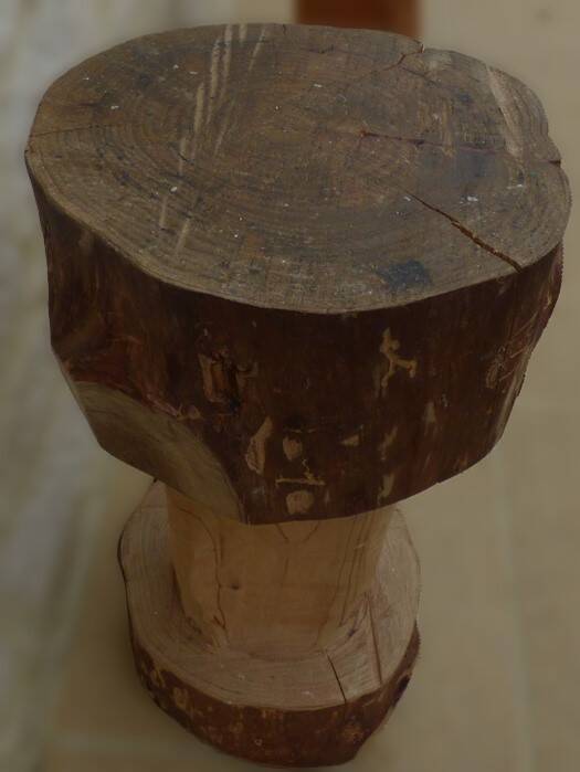 Large carved stool in solid oak