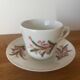 Vintage set of 7 cups and saucers in porcelain with defects.