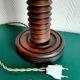 Wooden lamp with striped lampshade