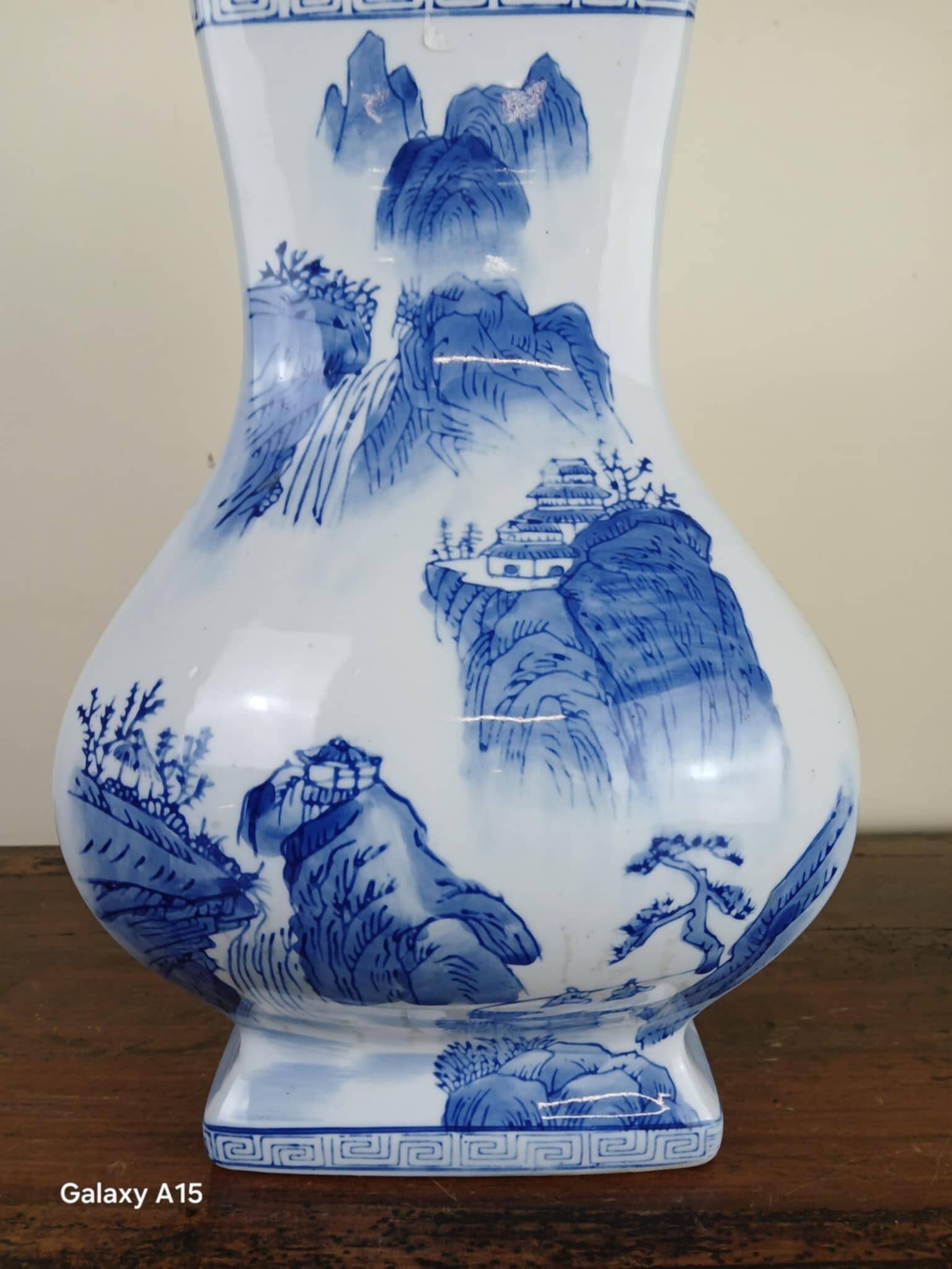 China circa 1920: porcelain vase with blue and white decoration