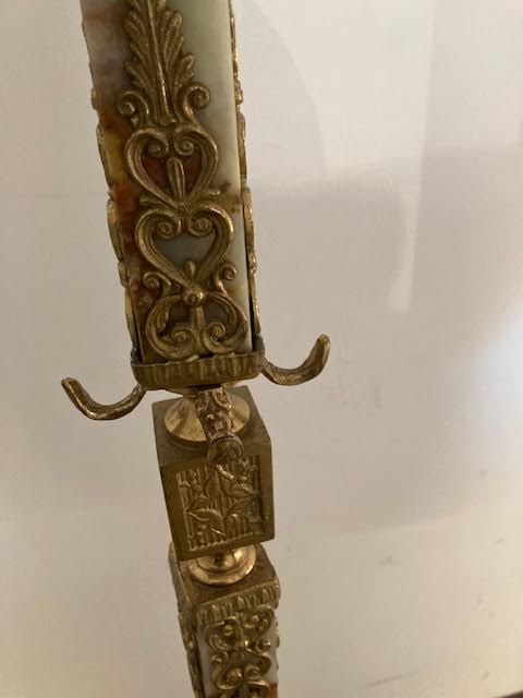 Marble and brass coat rack