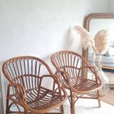Pair of vintage rattan armchairs circa the 1970s.
