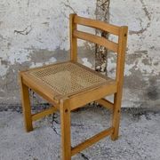 Série de 4 chaises vintage en pin assise cannage