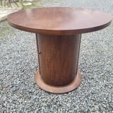 Vintage round oak coffee table with a door