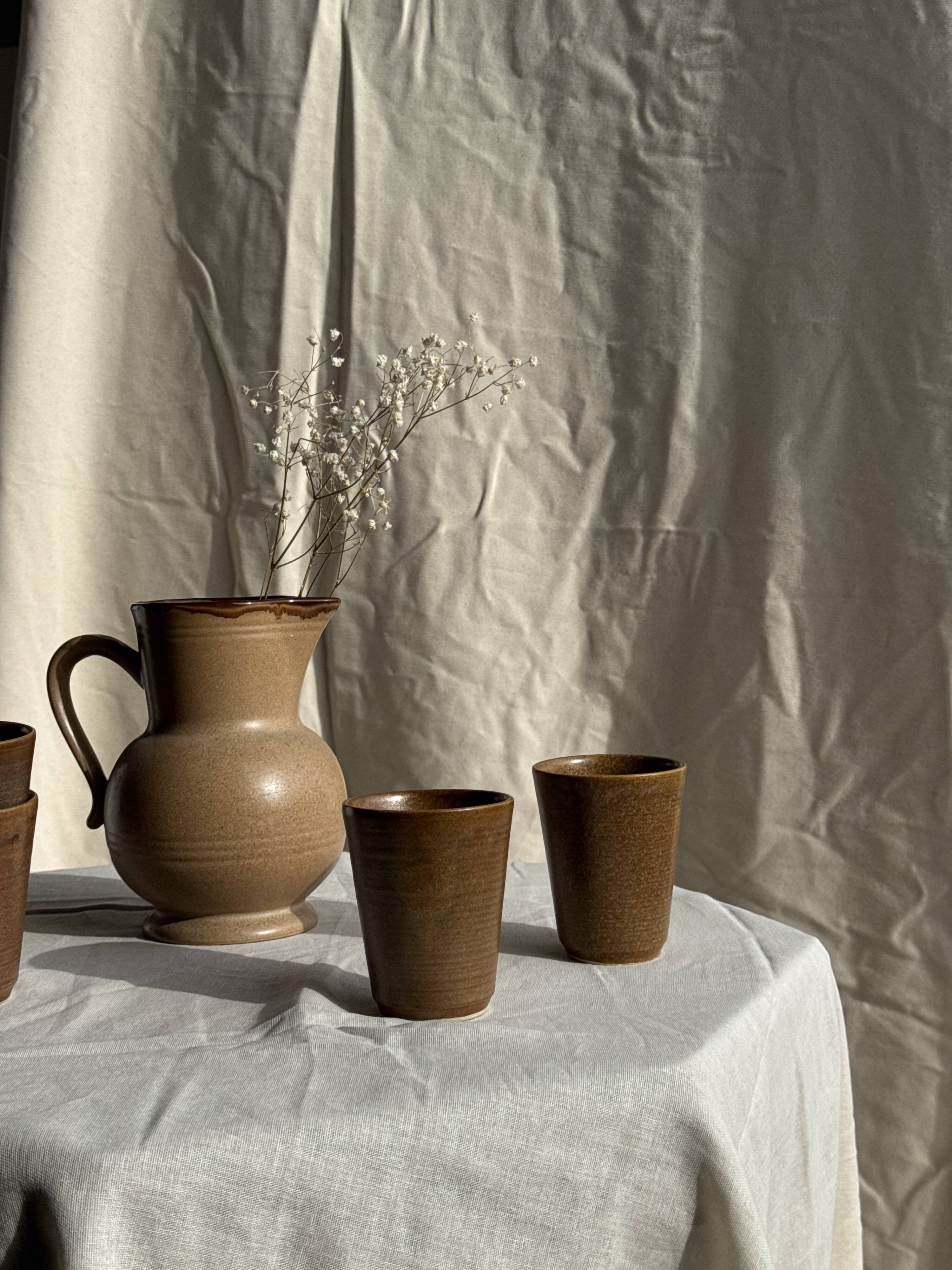 Set of 10 small stoneware mugs from Digoin.