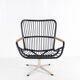Rattan and chrome armchair