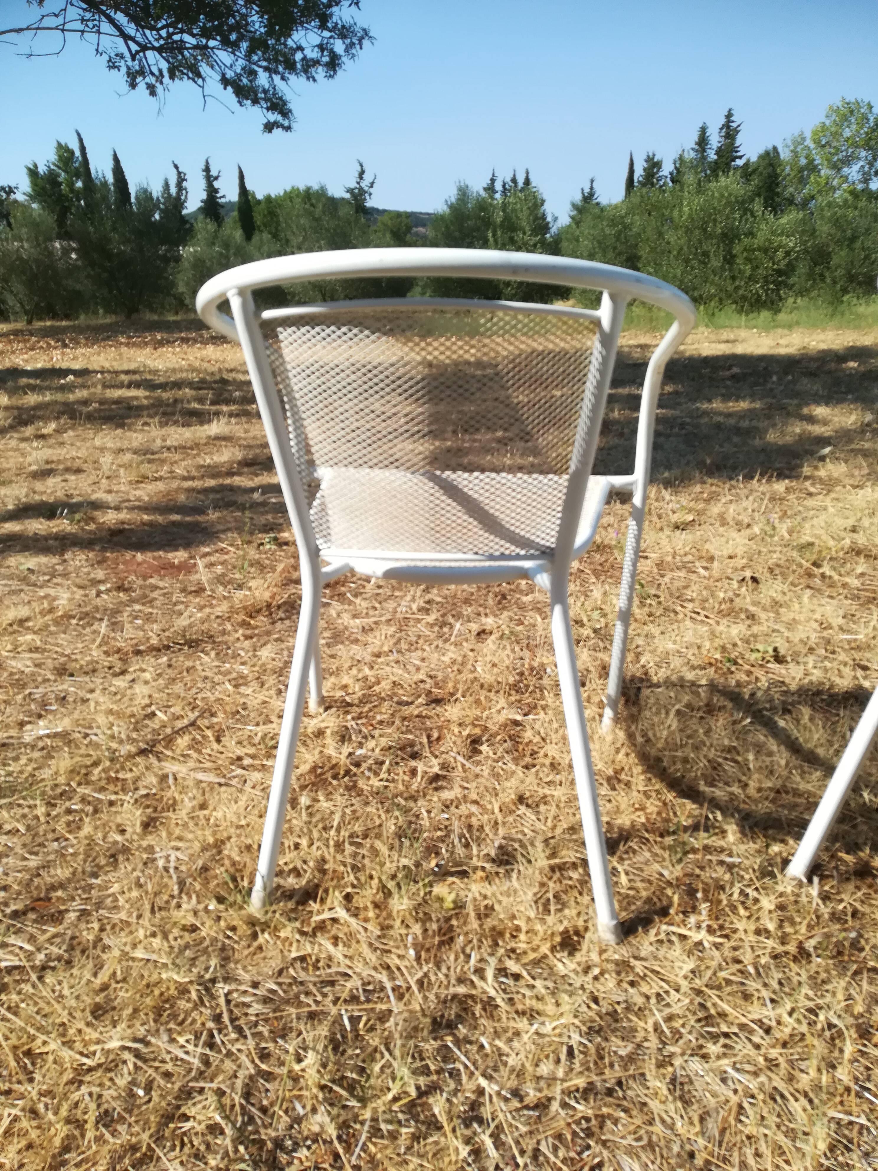 Pair of vintage white metal terrace armchairs