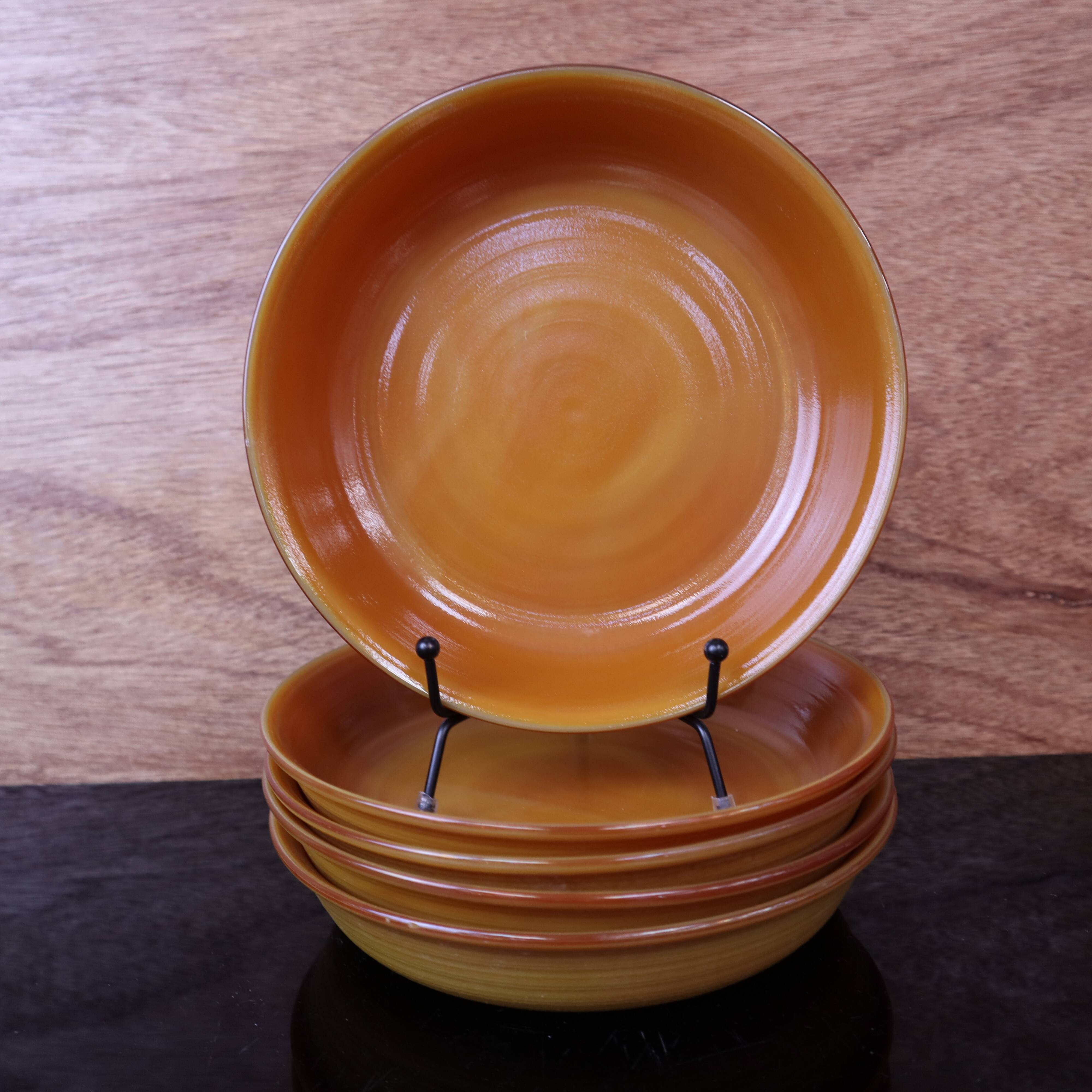 Set of 5 orange deep plates Arcopal France from the 1970s.