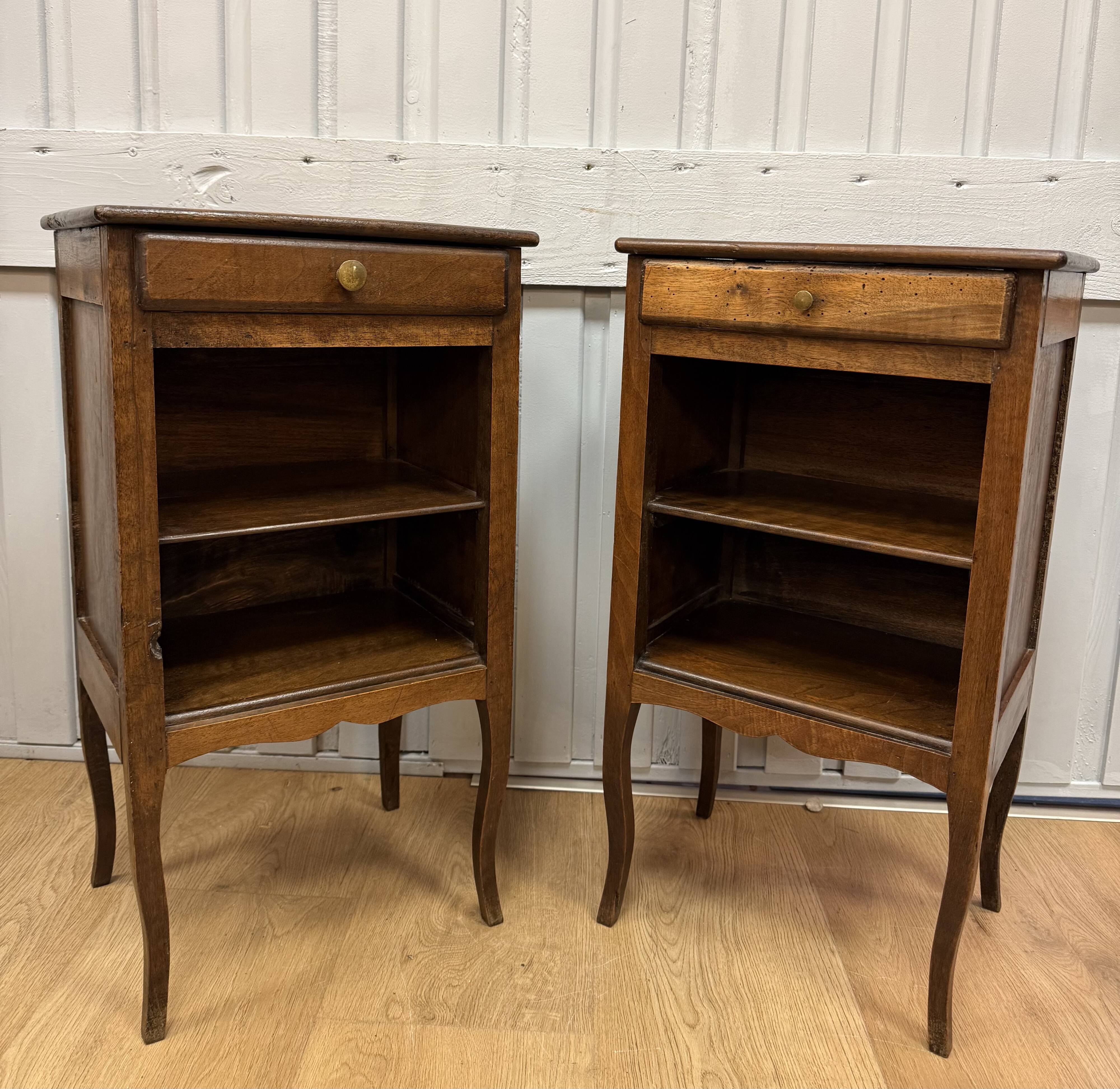 Pair of walnut bedside tables