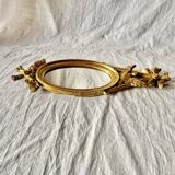 Vintage Empire style wall mirror in gold resin