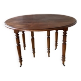 Table en noyer avec 6 pieds et 2 allonges