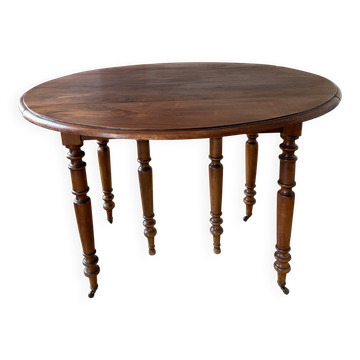 Table en noyer avec 6 pieds et 2 allonges