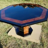 Octagonal table paul michel and its black lacquered chairs and elm magnifying glass
