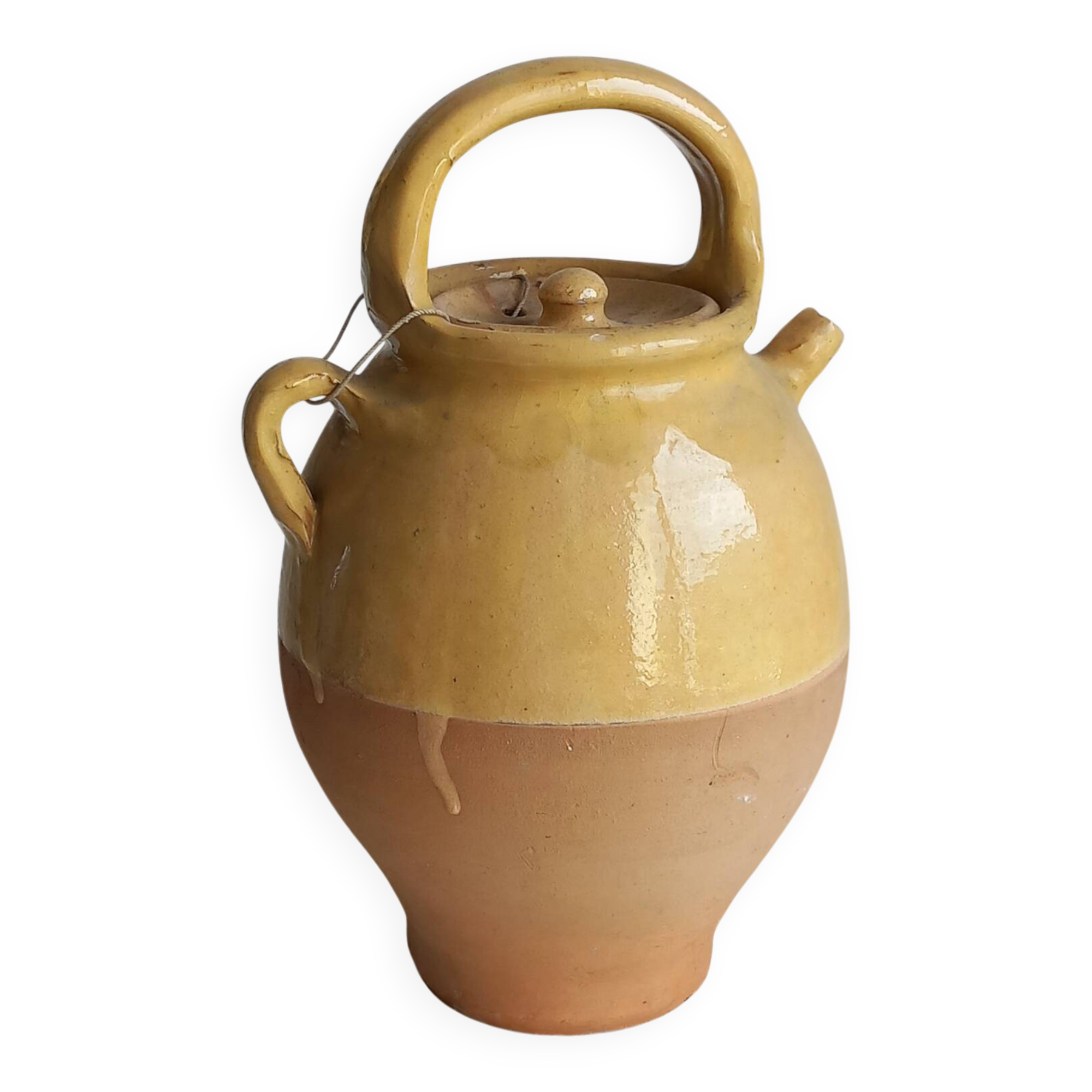 Cruche en terre cuite vernissée jaune