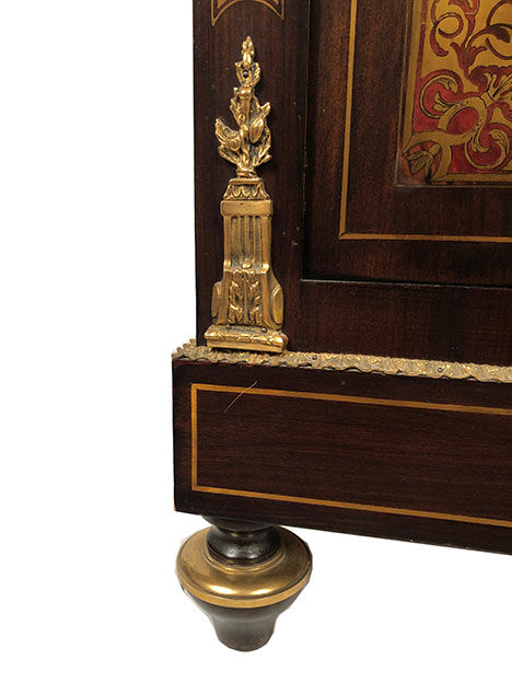 Varnished wood showcase and gold decoration in imitation of the so-called Boulle marquetry