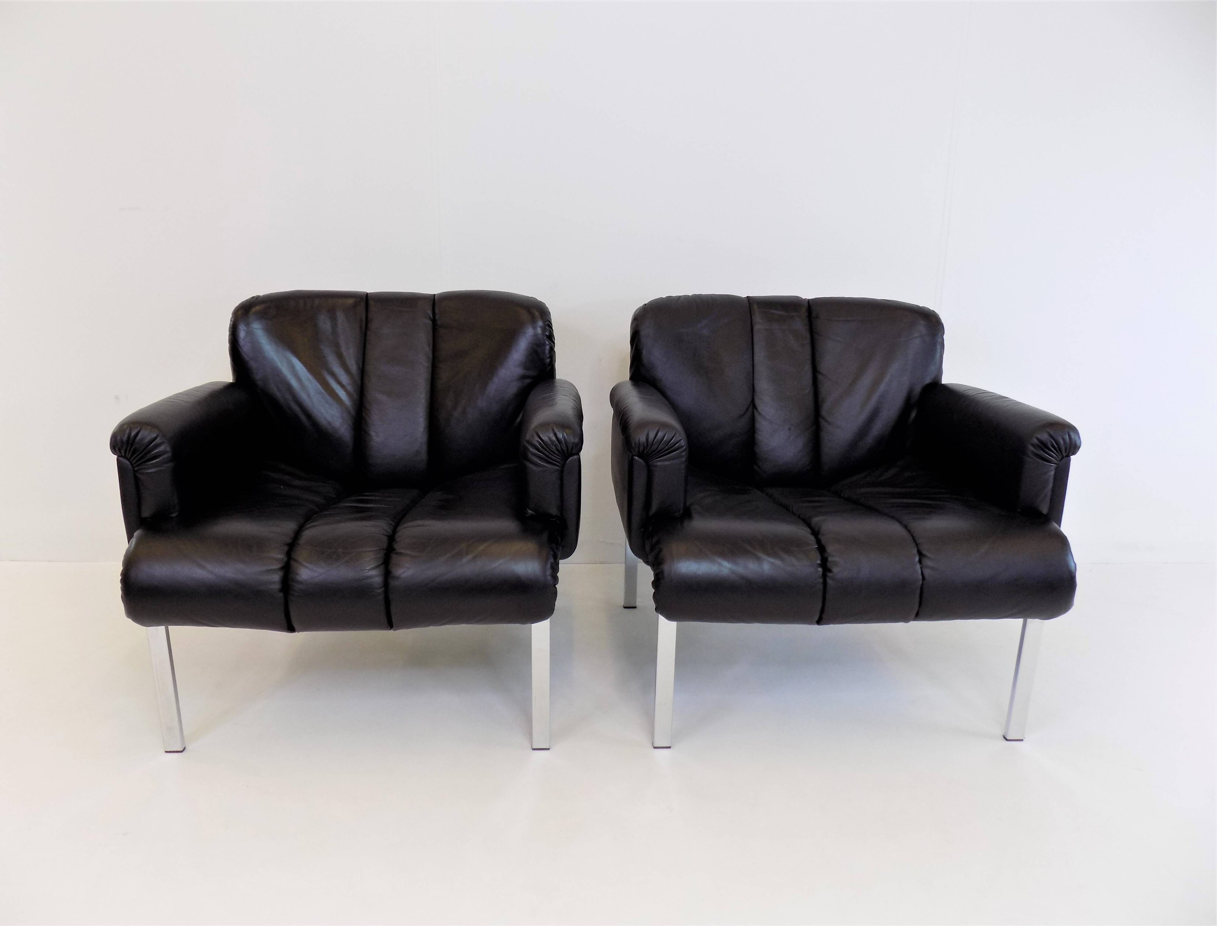 Set of 2 Girsberger Eurochair leather armchairs