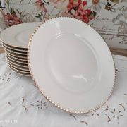 Set of 11 flat plates in porcelain Bavaria beige bordered gold model Jutta