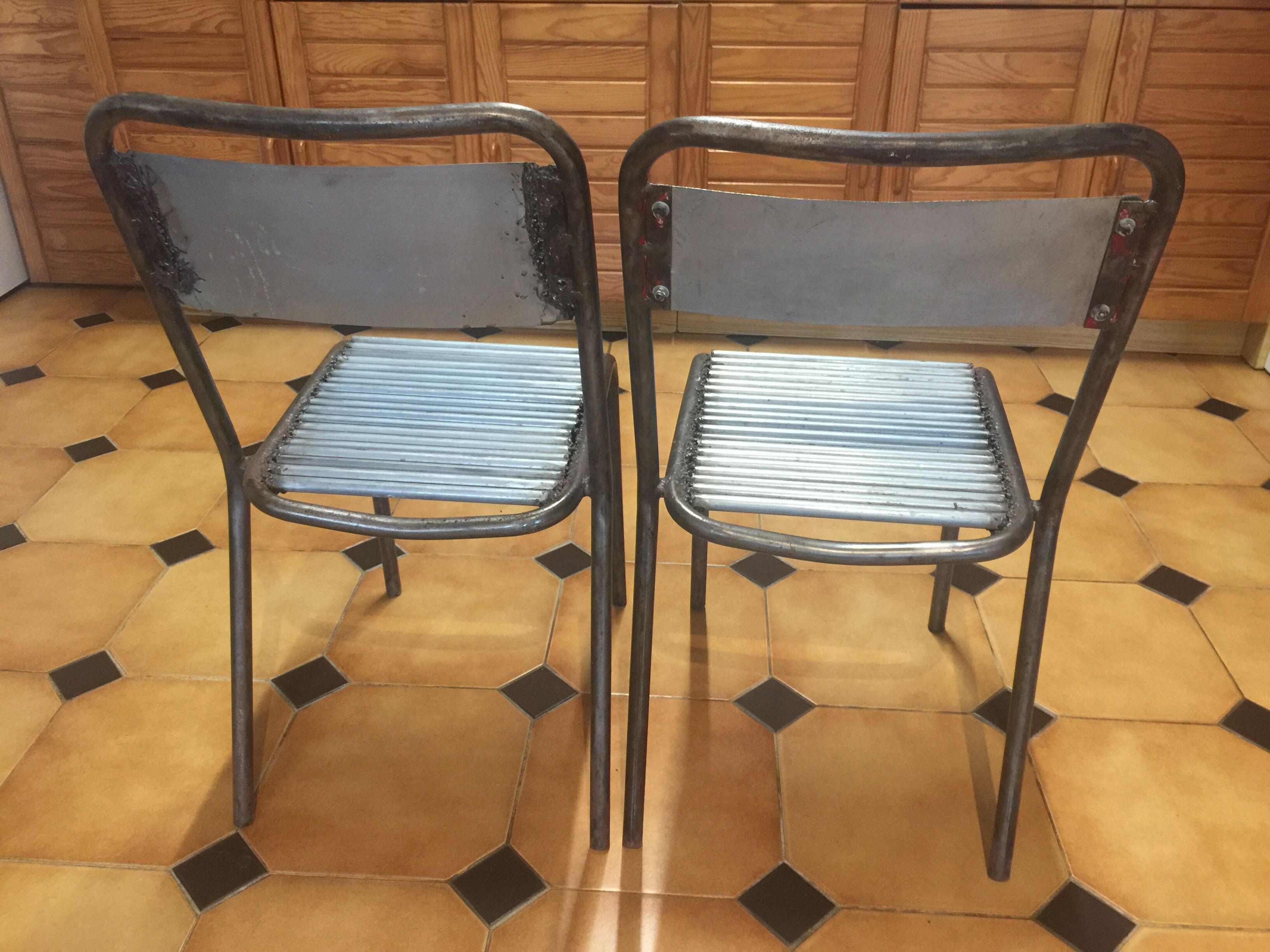 Pair of metal chairs