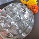 Vase pique-fleurs boule en verre épais à 19 trous France vintage