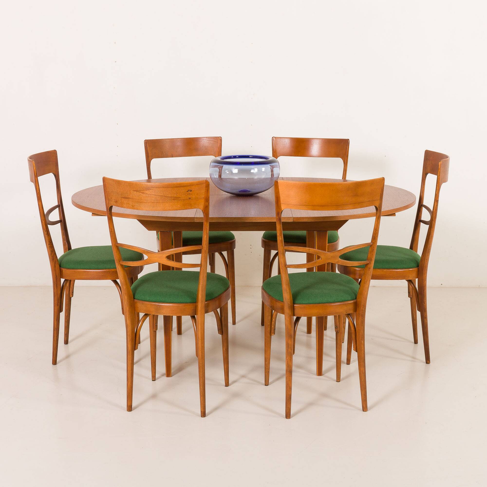 Scandinavian round teak table with hidden extension, 1970s
