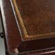 Antique English writing desk from the late 19th century with a warm colour