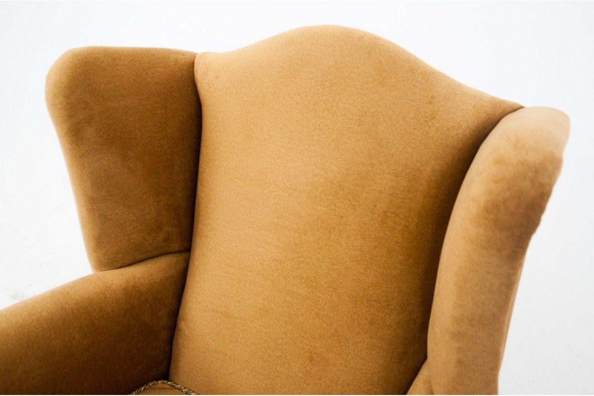 Yellow wingback armchair, Northern Europe, circa 1940s