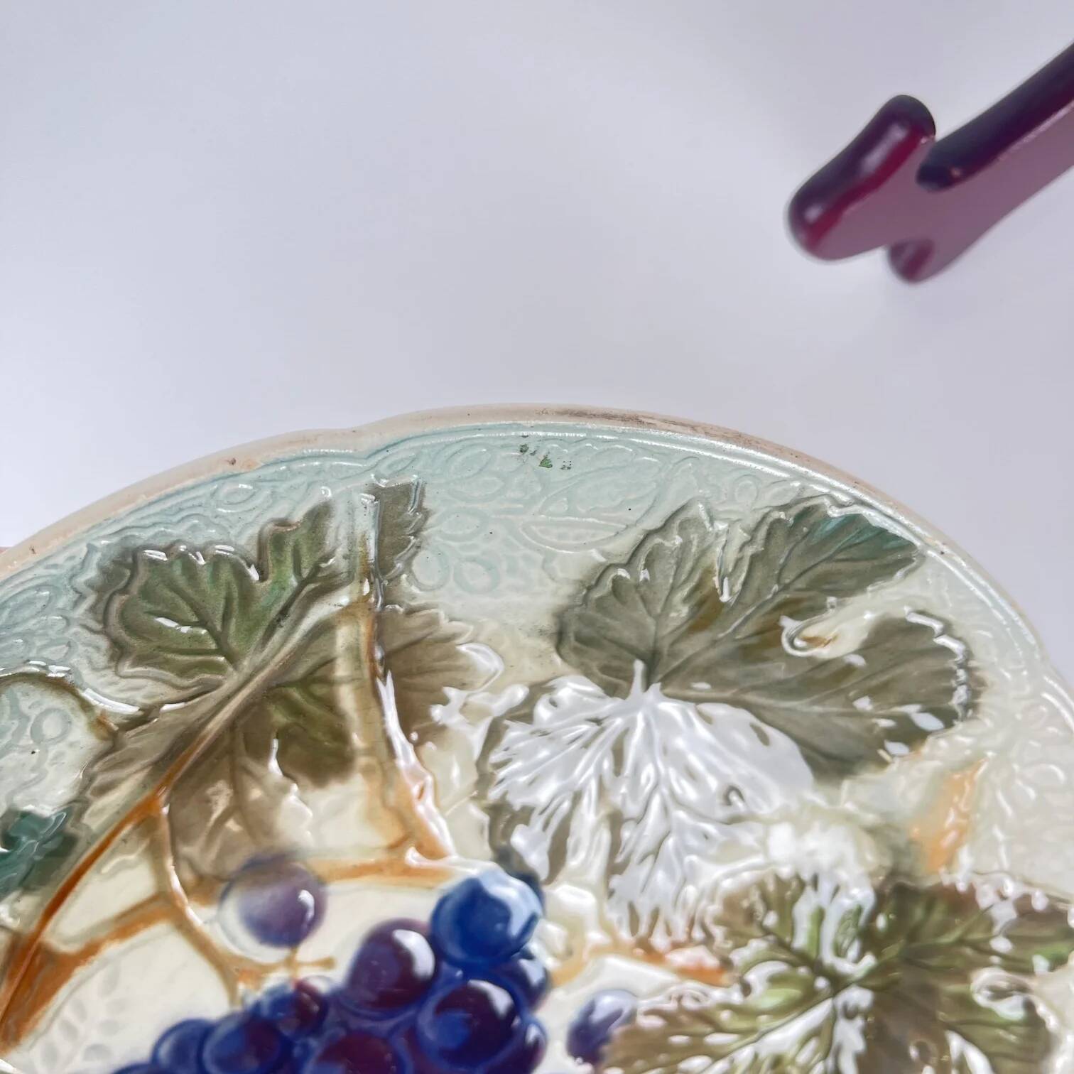 Set of 4 plates KG St Clément barbotine fruit (cherry, mirabelle, grape, pear), late 19th-early 20th century.