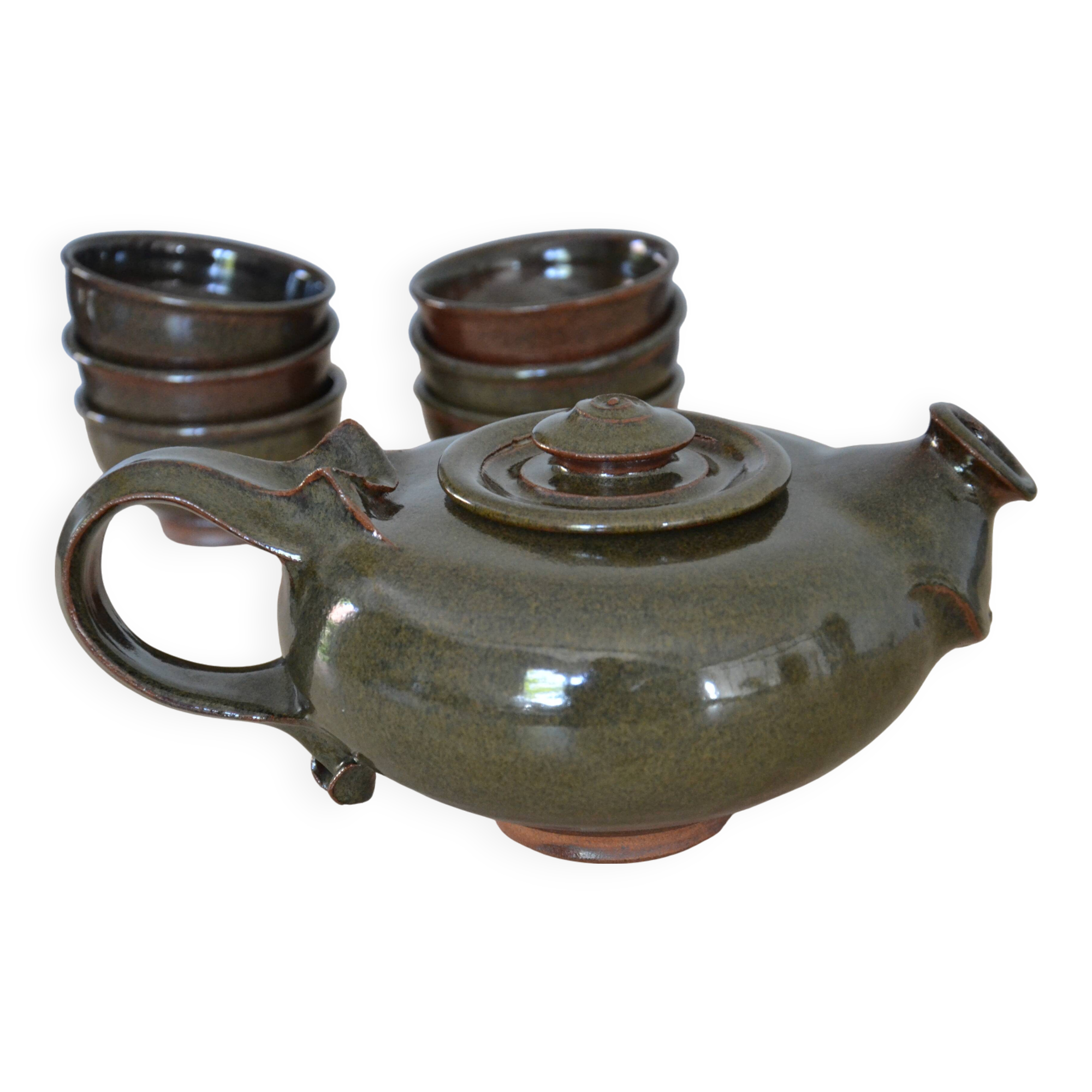 Antique stoneware teapot and its six signed bowls