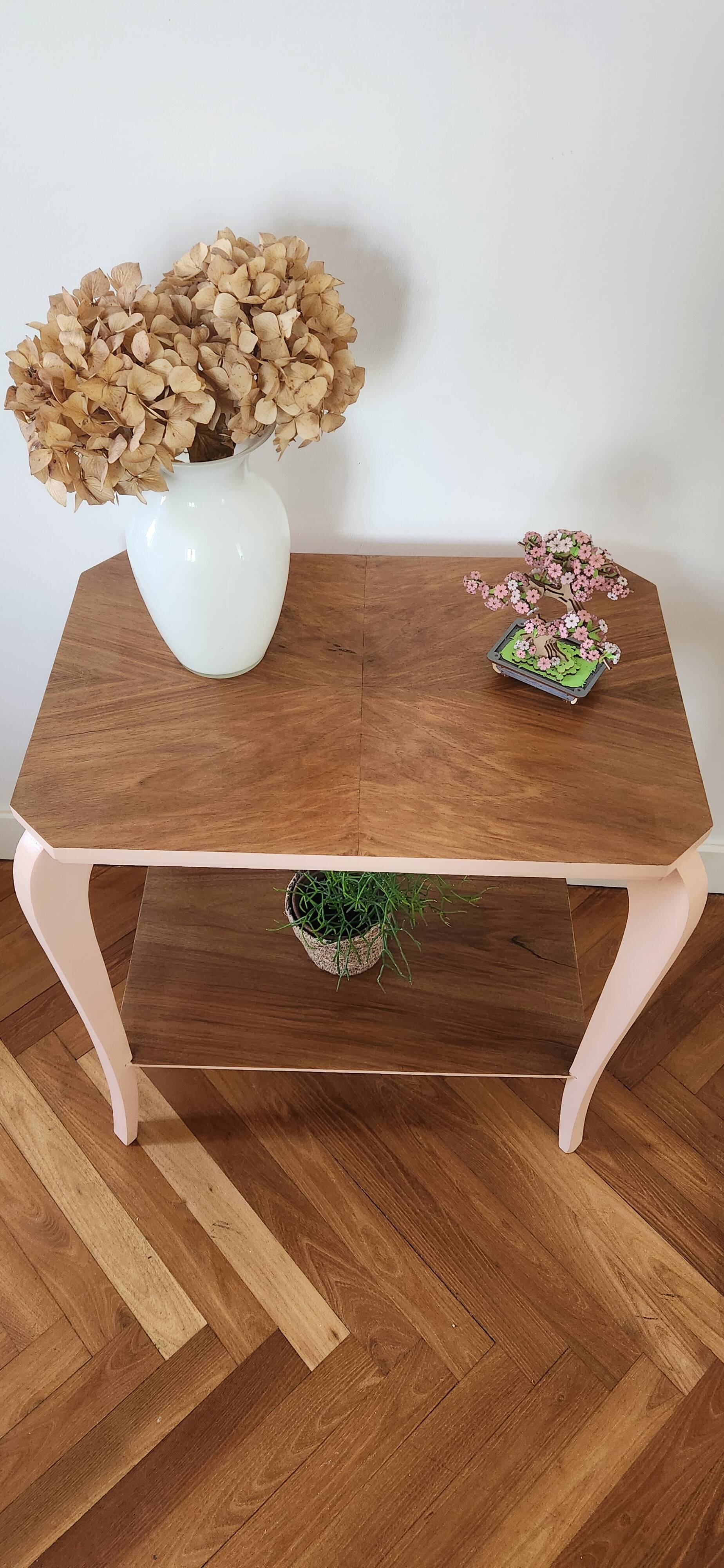 Side table with curved pink legs