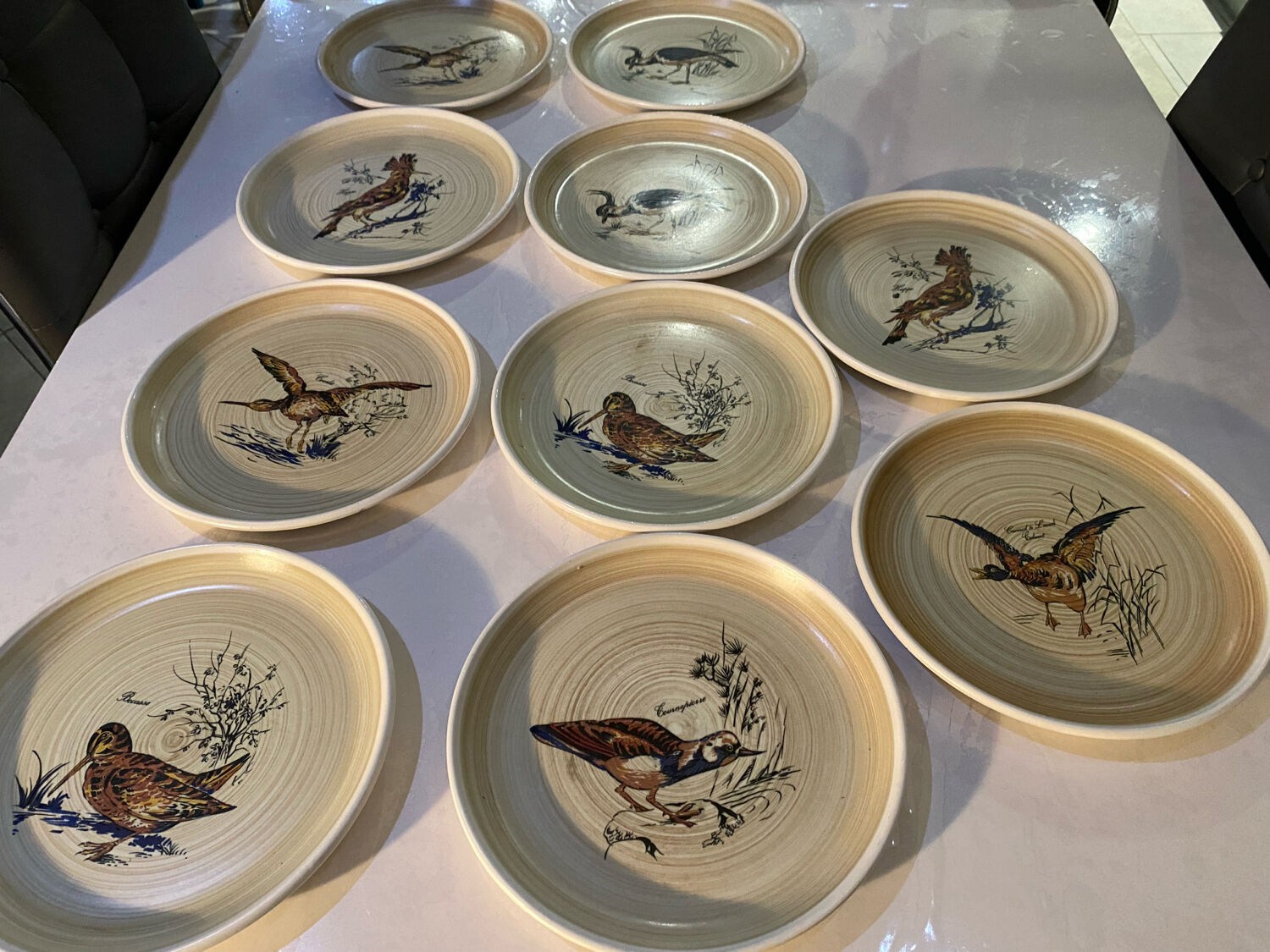 Many vintage flat plates from Sarreguemines.