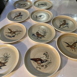 Many vintage flat plates from Sarreguemines.