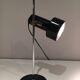 Adjustable lamp in black lacquered metal and chrome. French work. Circa 1970.