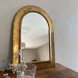 Brass half-moon mirror