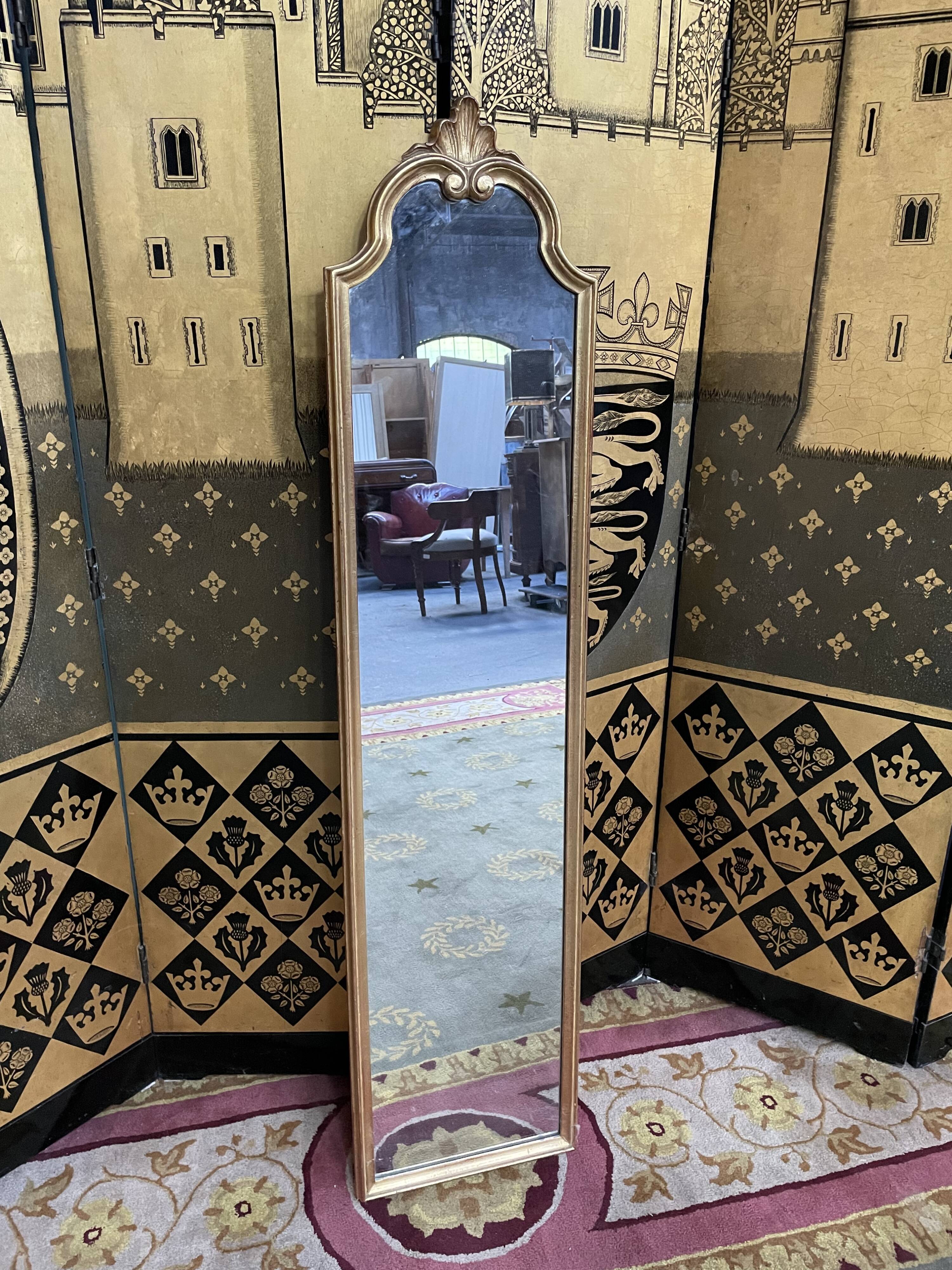 In-between mirror in gilded wood