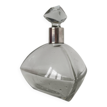Beautiful cut crystal carafe with its stopper and solid silver setting