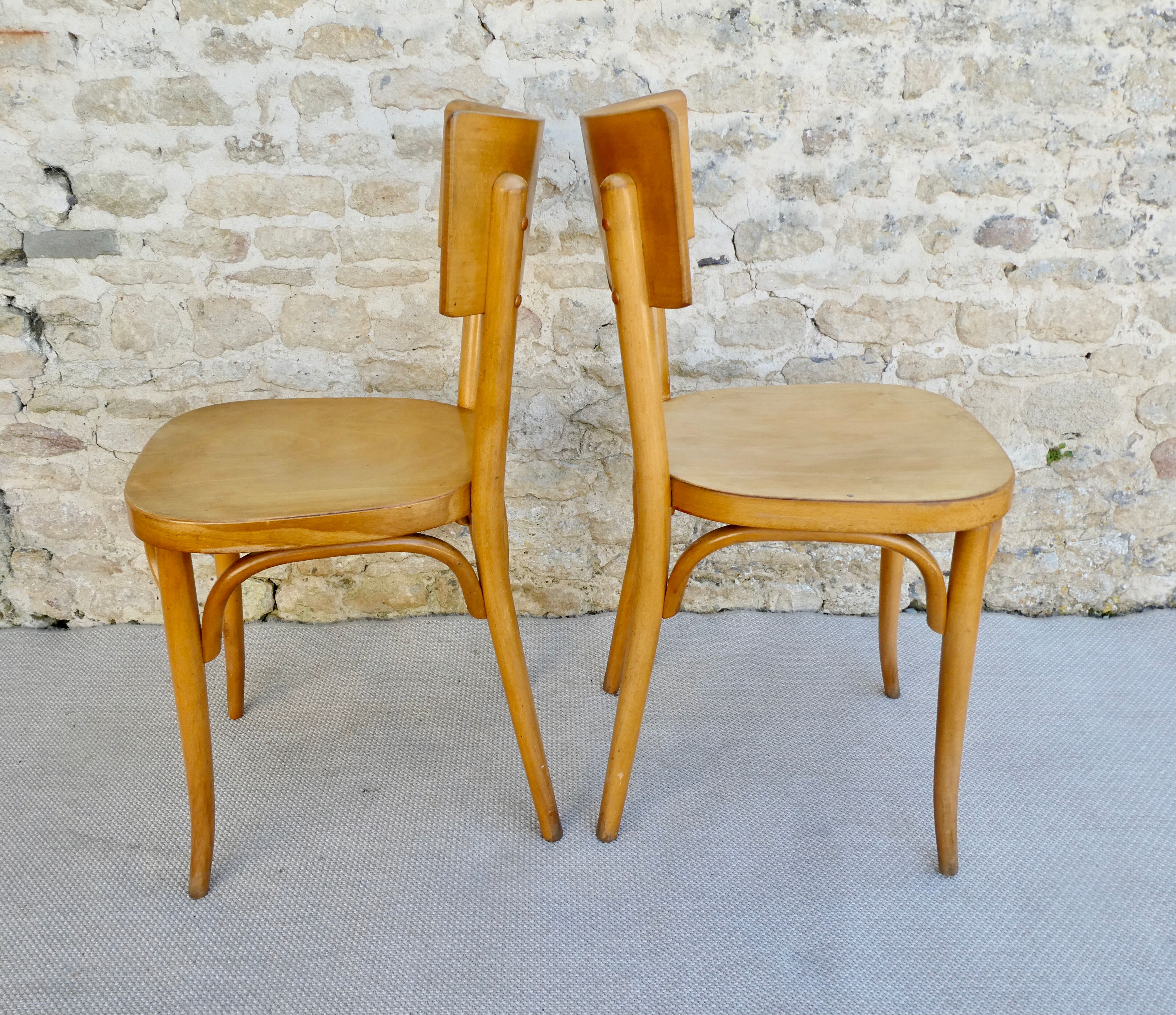 Pair of Baumann bistro chairs in light wood