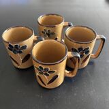 Set of 4 floral decorated mugs