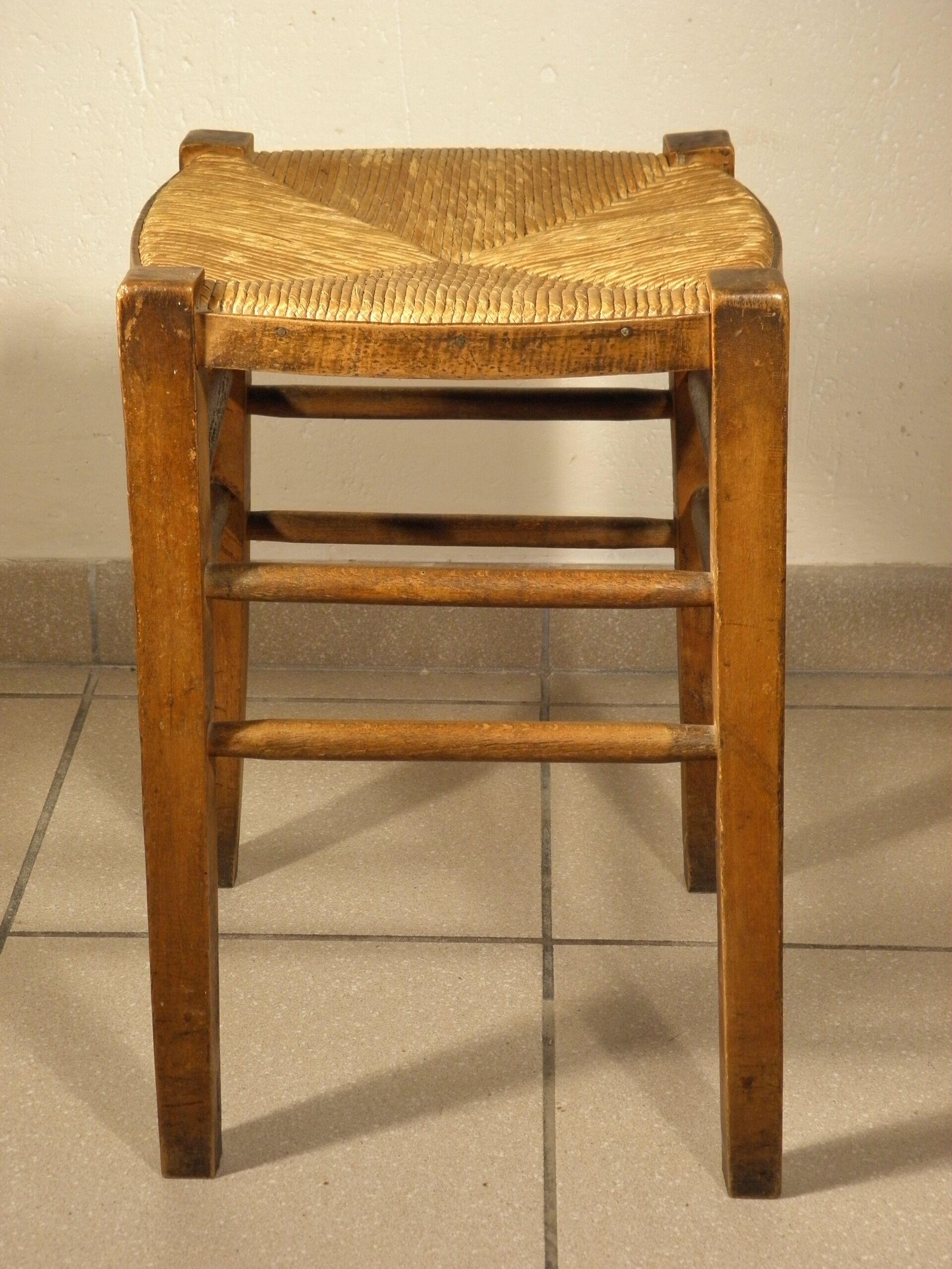 Wood and straw farm stool