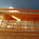 Wooden bed and vintage rattan