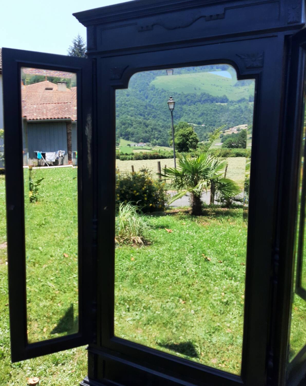 Dressmaker's cabinet with beveled triptych mirrors. (Mirror cabinet)