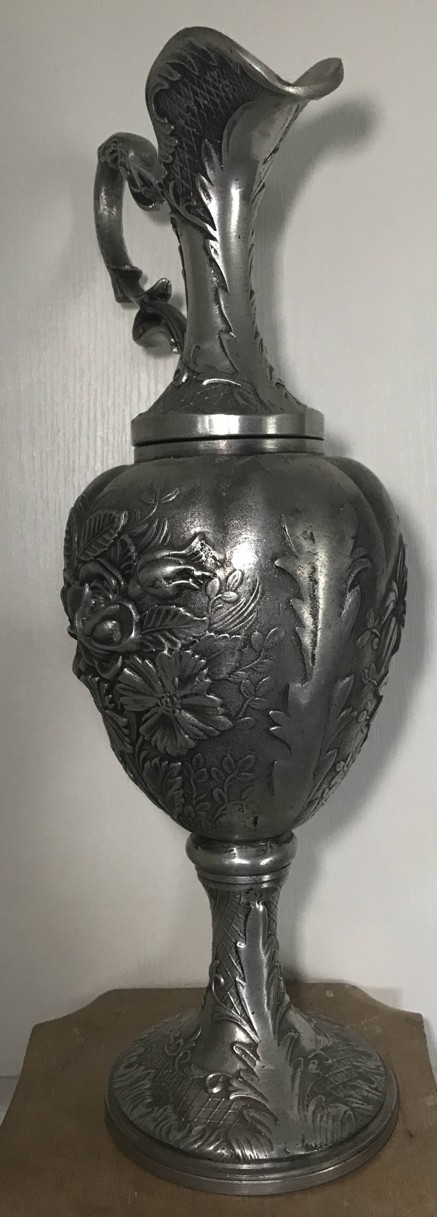 Ewer, Mauro Manetti art foundry, floral embossed decoration and bird's head handle