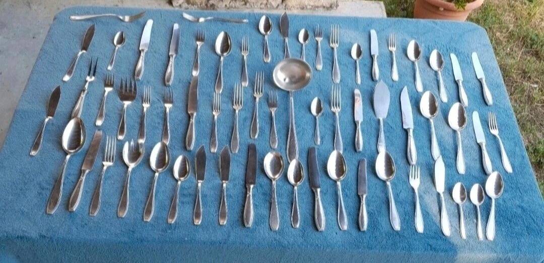 Silverware set for 6 place settings, weighing 4 kilos.