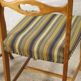 Set of four oak and wool dining room chairs by Henning Kjaernulf, 1960's