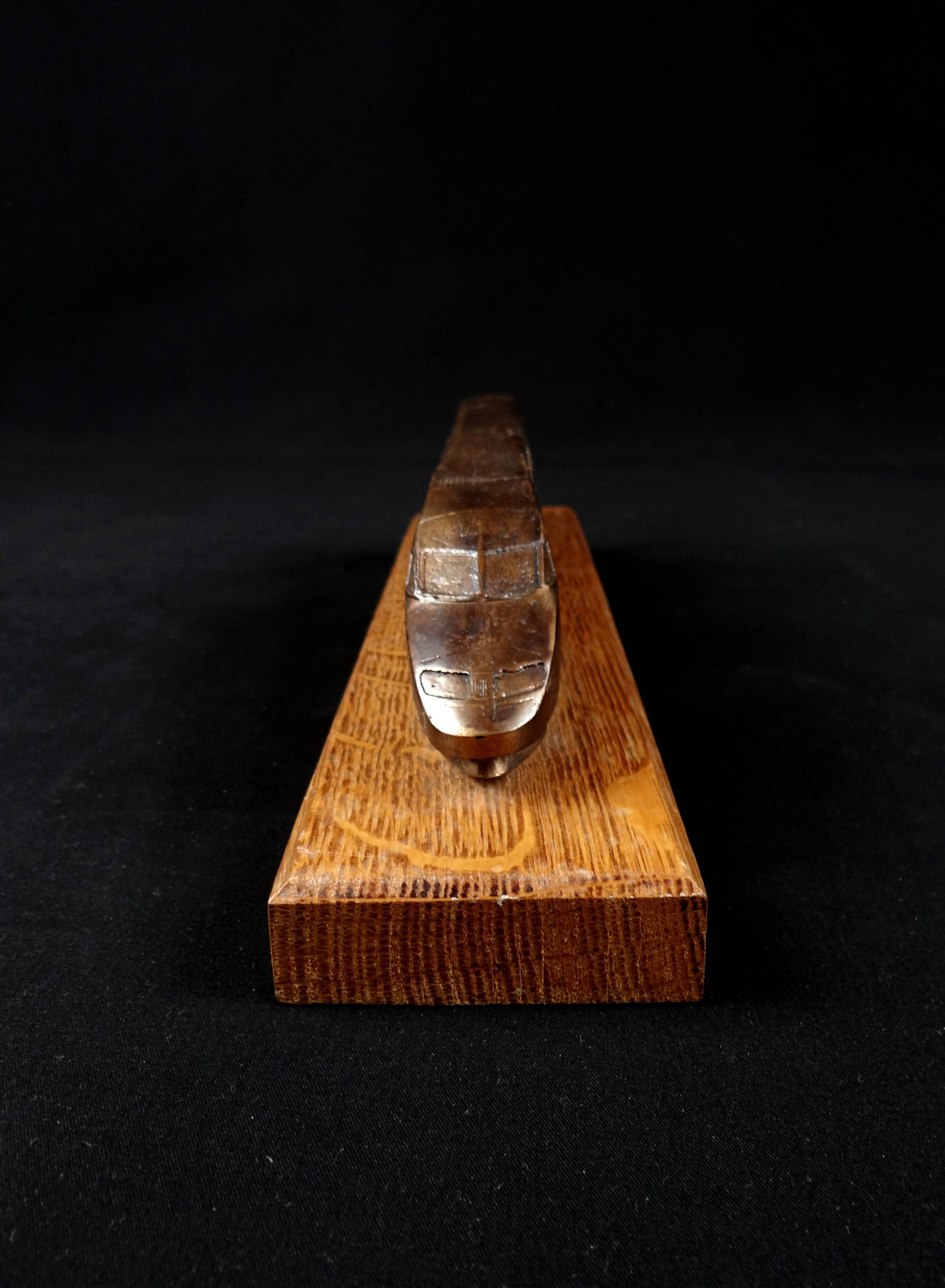 Bronze TGV on a wooden base, scale model of the TGV Sud-Est from the 1980s