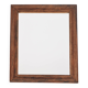 Old rectangular wooden mirror, frame decorated with edges