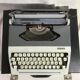Former HJapy white metal writing machine - grey - vintage black malle