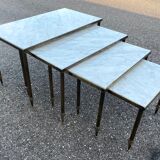 Pull-out table in marble and brass