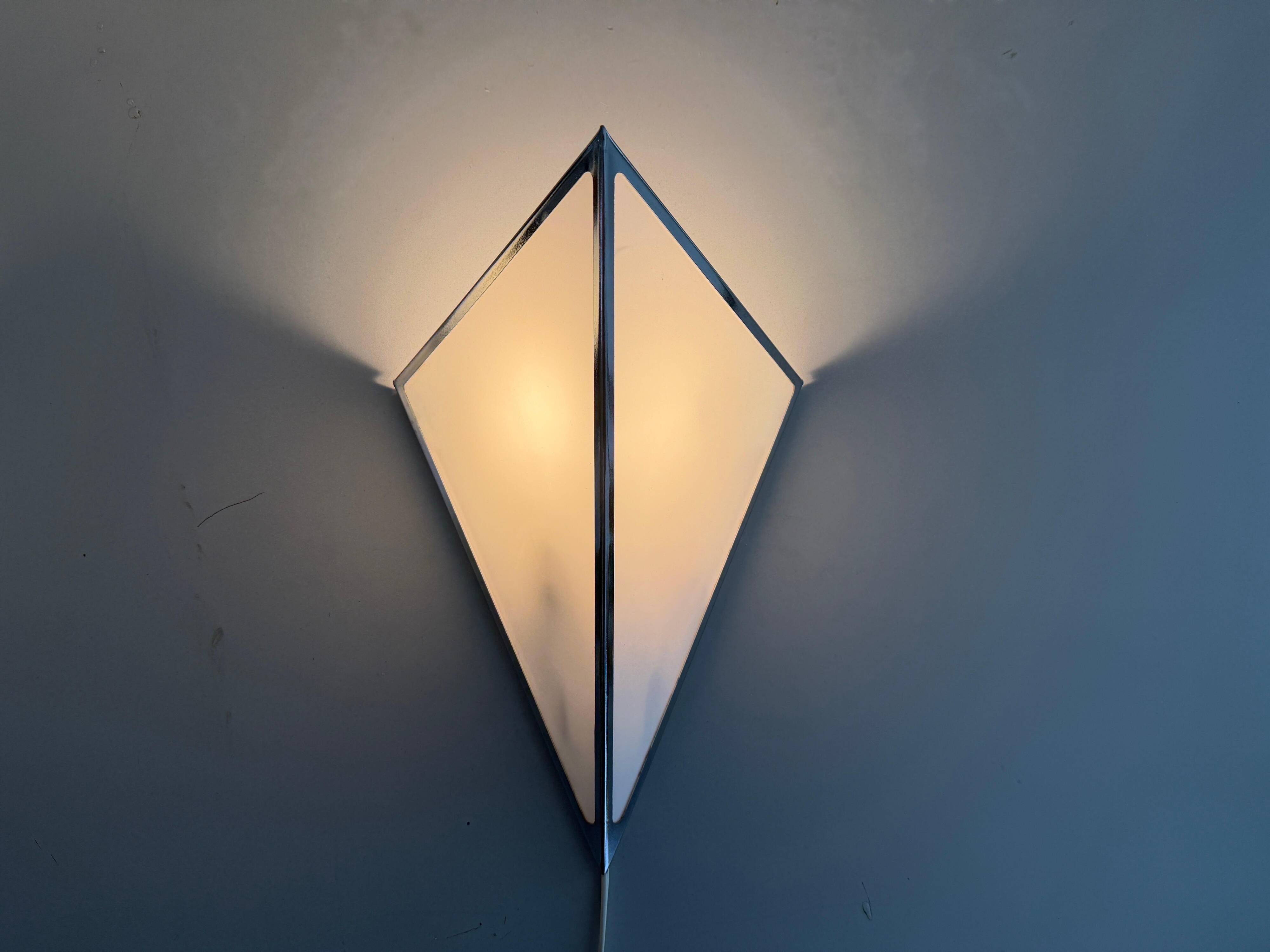 Simple opal glass wall light with an aluminium body, 1980s, Germany.